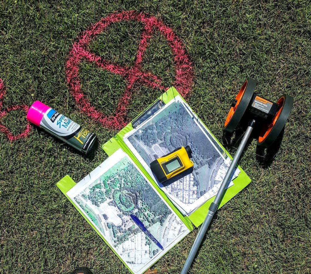 An image of tools use in designing disc golf course